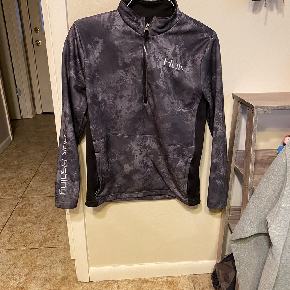 Huk fishing jacket. It is a small and is in good condition